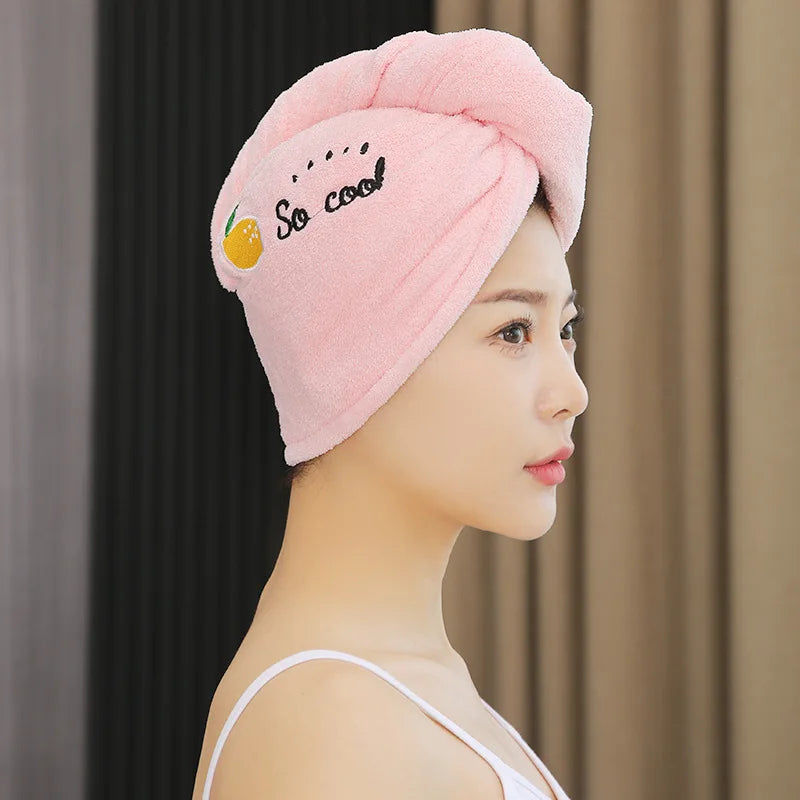 Toalha de cabelo super absorvente e macia para mulheres. Toca estilosa e fácil de usar.